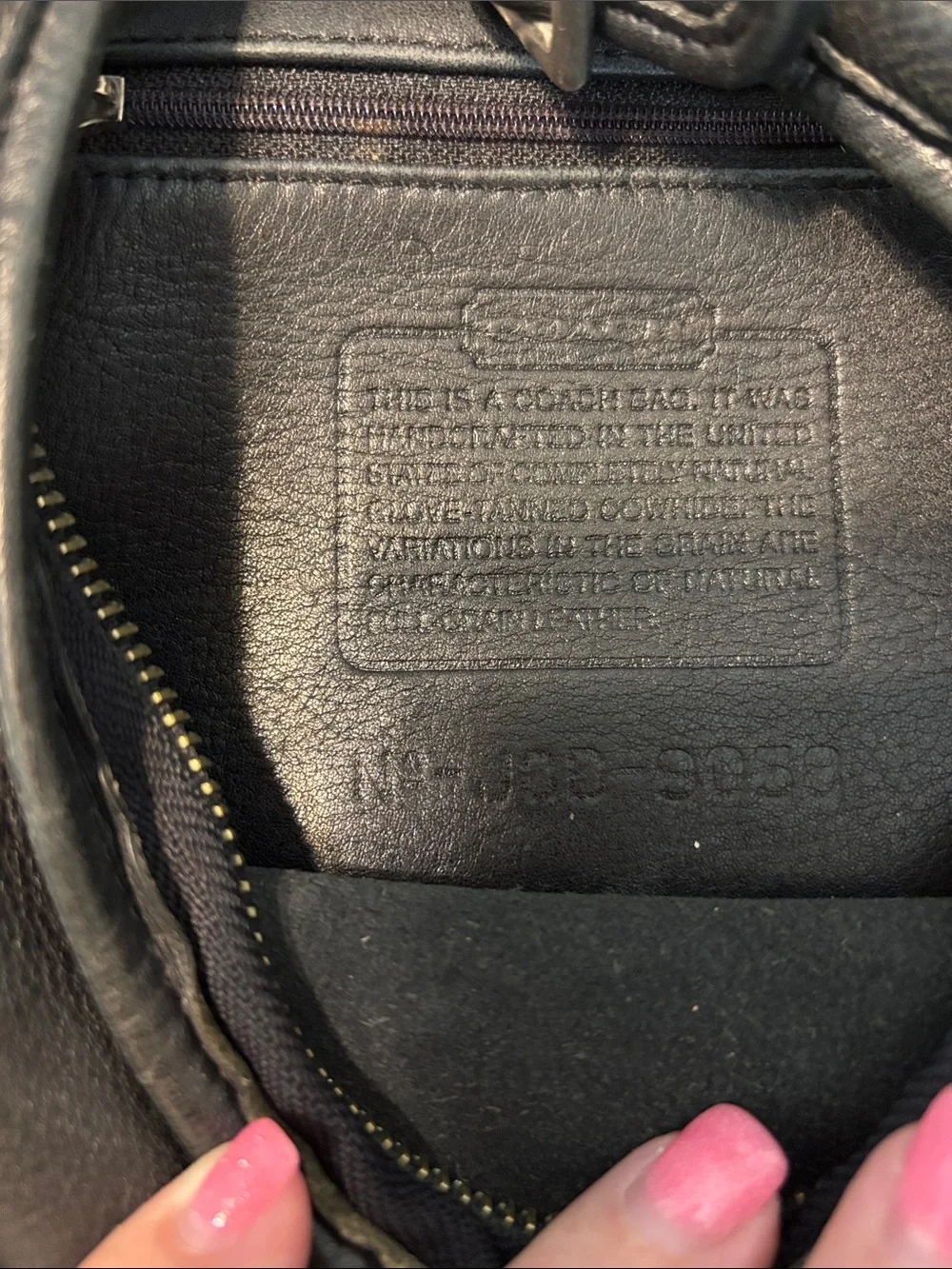 Coach sleek black